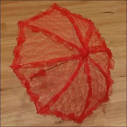 Red ruffle lace parasol